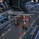 Various superheroes standing around in a crowd.